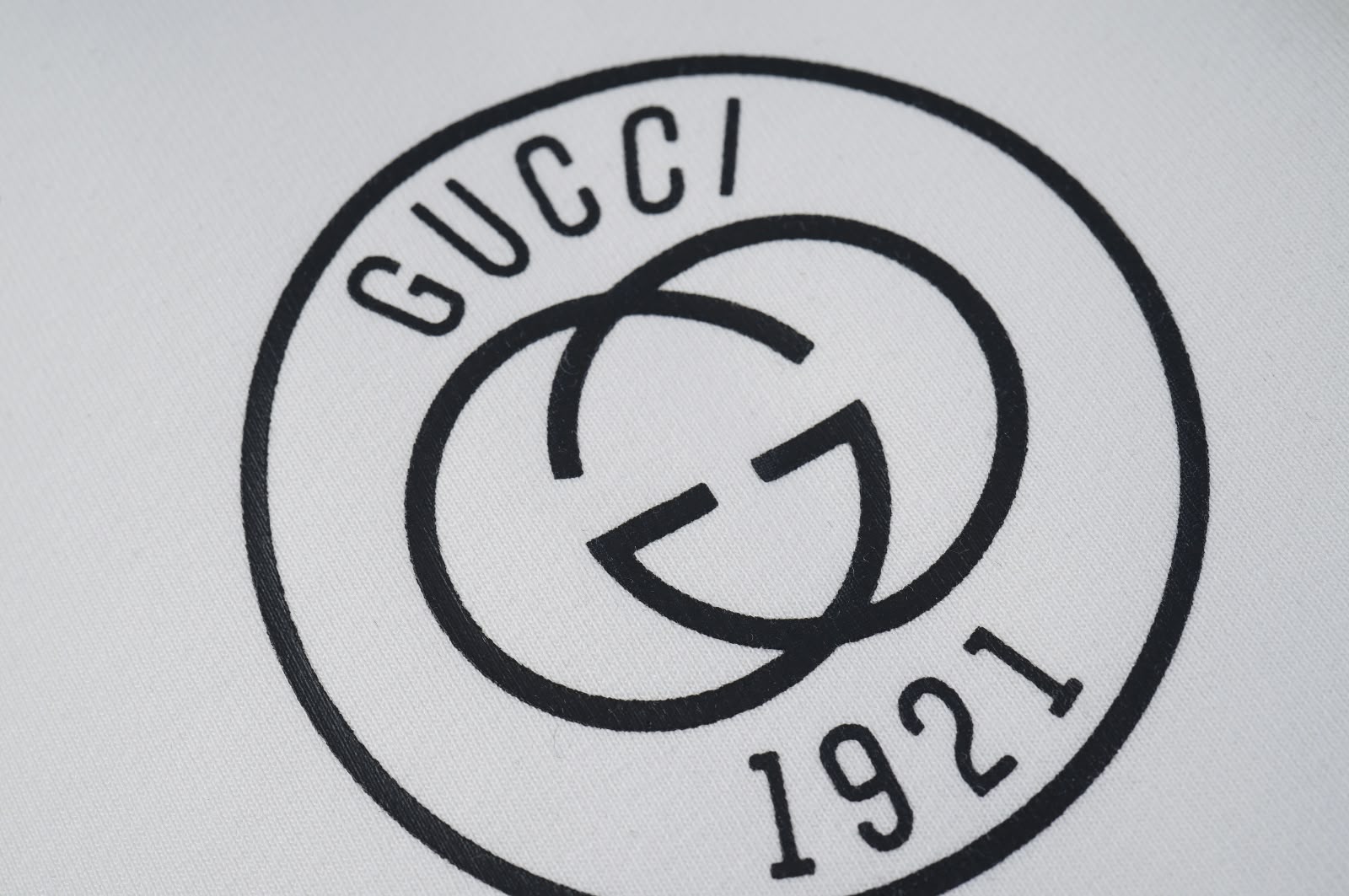 Calça Jogger Gucci Paris 1921 Interlocking G – Off White detalhe 6